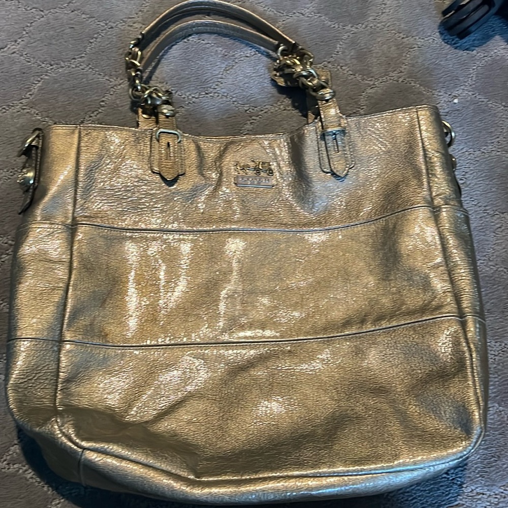 Large gold patent leather coach, shoulder bag